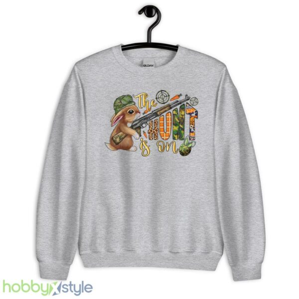 The Hunt Is On Shirt, Easter Carrot and Camouflage Eggs Shirt - Unisex Heavy Blend Crewneck Sweatshirt