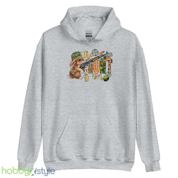 The Hunt Is On Shirt, Easter Carrot and Camouflage Eggs Shirt - Unisex Heavy Blend Hooded Sweatshirt