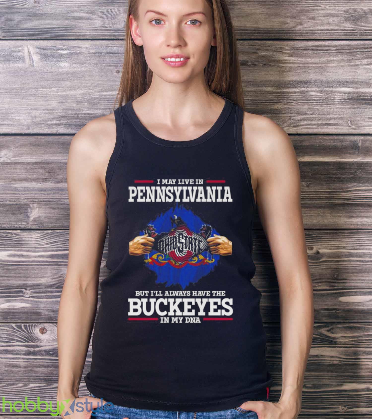 I May Live In Pennsylvania But I’ll Always Have The Ohio State Buckeyes In My DNA 2023 shirt - Ladies Tank Top