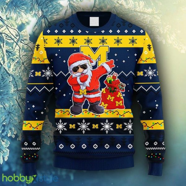 NCAA Christmas Michigan Wolverines Dabbing Santa Claus Christmas Ugly Sweater For Men Women - NCAA Michigan Wolverines Dabbing Santa Claus Christmas Ugly Sweater_1