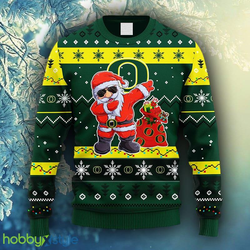 NCAA Christmas Oregon Ducks Dabbing Santa Claus Christmas Ugly Sweater For Men Women - NCAA Oregon Ducks Dabbing Santa Claus Christmas Ugly Sweater_1